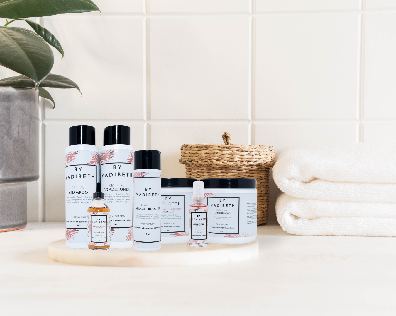  "BY YADIBETH hair care products featuring rice water, berries, banana, olive oil, honey, kiwi, and cucumber for comprehensive scalp and hair health."